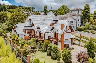 Casa com 6 dormitórios, 838 m², à venda por r$ 4.990.000- condomínio aldeia austríaca - campos do jordão/sp