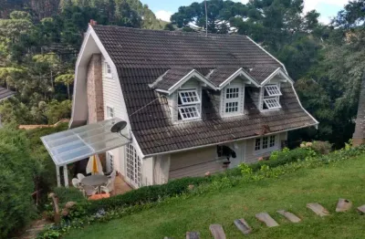 Casa à venda com 3 suítes no condomínio recanto do fojo em campos do jordão/sp