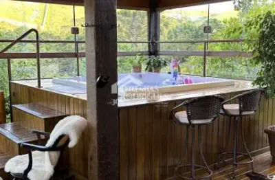 Casa à venda com 5 suítes no bairro nova capivari em campos do jordão/sp