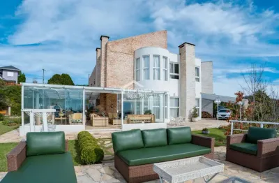 Casa com 4 suítes, 700 m² - condomínio iporanga - campos do jordão/sp