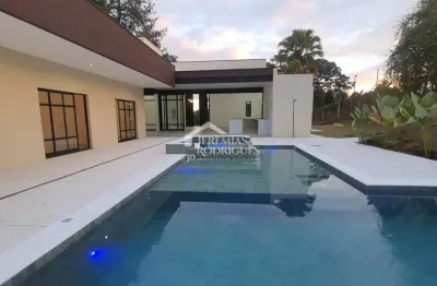 Casa à venda com 3 suítes no condomínio chácaras cataguá em taubaté/sp.