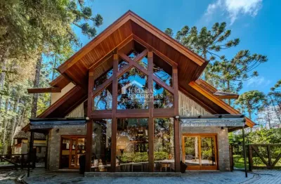 Casa à venda com 3 suítes no condomínio reserva figueiredo em campos do jordão/sp.