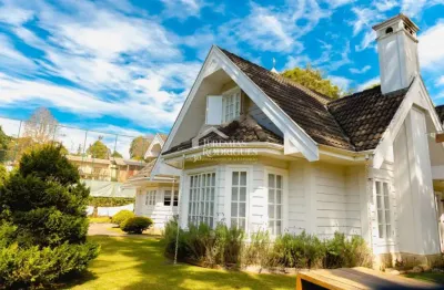 Casa à venda com 4 dormitórios no bairro jardim embaixador em campos do jordão/sp.