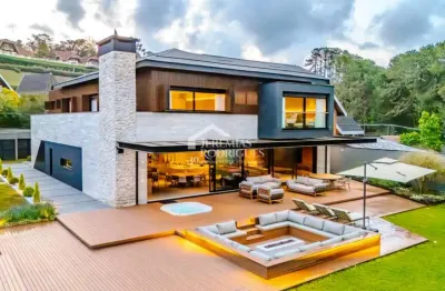 Mansão à venda com 5 suítes no alto do capivari em campos do jordão/sp.