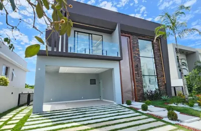 Casa em alphaville litoral norte 1 com 4 suítes nova piscina e espaço gourmet