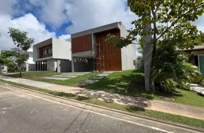 Casa a venda em alphaville litoral norte 2 com 4 suites