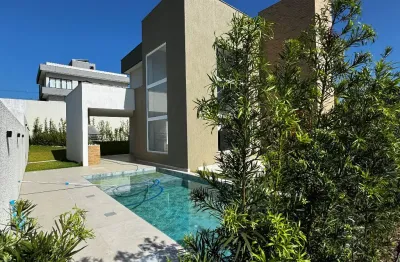 Casa a venda em alphaville litoral norte 3 com 4 suites piscina e área gourmet