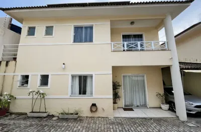 Casa a venda em stella maris com 3 suites e área gourmet em condominio fechado