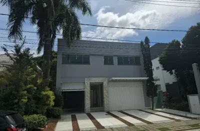 Casa a venda em alphaville 1 com 4 suites piscina e área gourmet