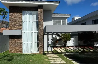 Casa a venda em alphaville litoral norte 3 com 4 suites piscina e área gourmet