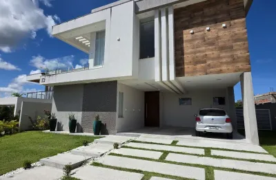Casa a venda em alphaville litoral norte 3 com 4 suites piscina e área gourmet