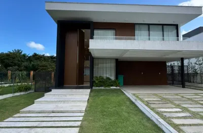 Casa a venda em alphaville litoral norte 3 com 4 suites piscina e área gourmet