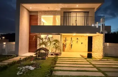 Casa a venda em Alphaville Litoral Norte 3 com 4 quartos piscina área gourmet e nova