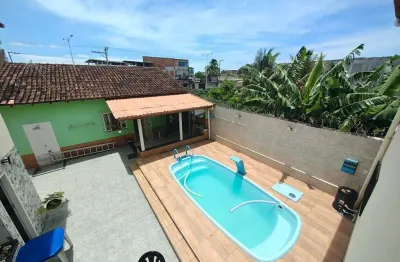 Imóvel de alto padrão: Casa com 5 quartos, 380m², 2 vagas na Nova Almeida Centro, Serra-ES. Venha conferir!