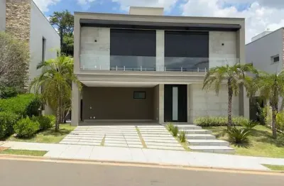 Imperdível: casa em condomínio de luxo em alphaville dom pedro, campinas-sp, com 4 suítes, 403m² e 4 vagas de garagem!