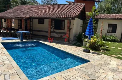 Casa de luxo em condomínio à venda em Bertioga-SP, 5 quartos, 2 salas, 2 banheiros, 4 vagas de garagem, 200m² de área.