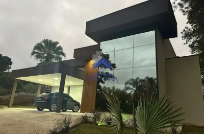 Casa térrea de 410m² com 3 suítes no chácaras cataguá em taubaté/sp