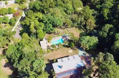 Chácara de 4500 m² pé na água em condomínio mairiporã - permuta