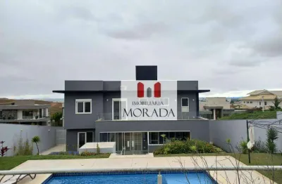 Casa com 5 dormitórios, 350 m² - venda por r$ 3.500.000,00 ou aluguel por r$ 20.000,00/mês - condomínio reserva do paratehy - são josé dos campos/sp