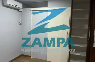 Sala comercial de 35m² com ar condicionado, banheiro e 1 vaga coberta na vila arens