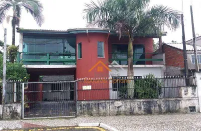 Casa com 4 dormitórios, frente para o mar para alugar, 300 m² por r$ 3.799/mês - massaguaçu - caraguatatuba/sp