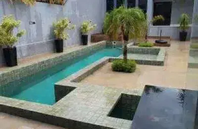 Casa de condomínio para venda tem 600 metros quadrados com 4 quartos