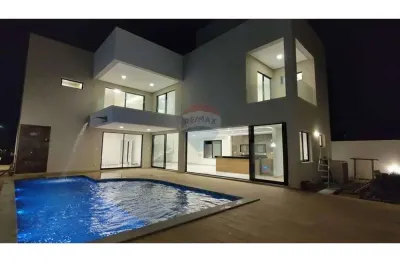 Casa de alto padrão com projeto moderno e living integrado no alphaville sergipe