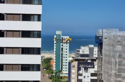 Apartamento com vista para o mar de 2 dormitórios, um sendo suíte.