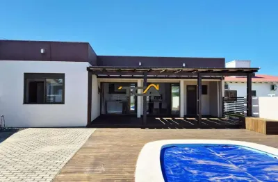Casa com piscina apenas 100m do mar na itapeva em torres-rs
