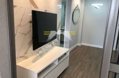 APARTAMENTO SEMINOVO E SEMIMOBILIADO, DE 68m², COM VARANDA GOURMET E DUAS VAGAS DE GARAGEM, À VENDA