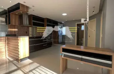 Apartamento com 2 dormitórios e armários completos na cozinha, quarto de casal e lavanderia a venda