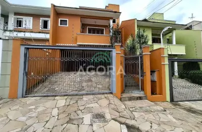 Sobrado com 3 (três) dormitórios,  localizado no bairro moinhos  de vento em canoas .