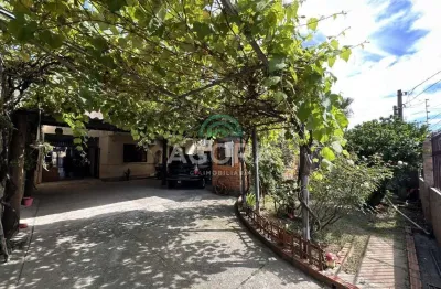 Sobrado com 7 (sete) dormitórios, sendo 2 (duas) suítes, localizado no bairro fátima em canoas.