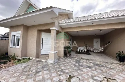 Casa térrea com 3 dormitórios sendo 2 suítes, localizada no bairro niterói em canoas.