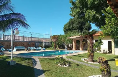 Casa quatro quartos sendo duas suítes 200 metros da lagoa