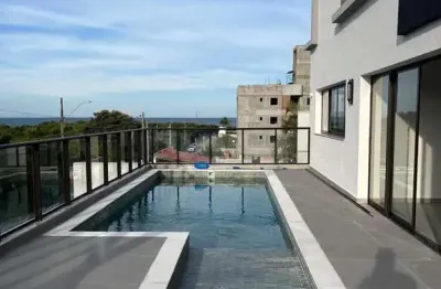 Apartamento com vista mar e escritura publica aproximadamente 250 metros do mar, na praia do santinho, florianópolis/sc.