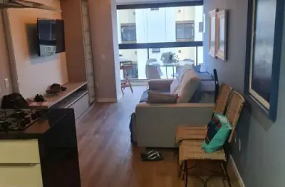Apartamento mobiliado (porteira fechada) com 64m² á aproximadamente 200 metros da praia brava.