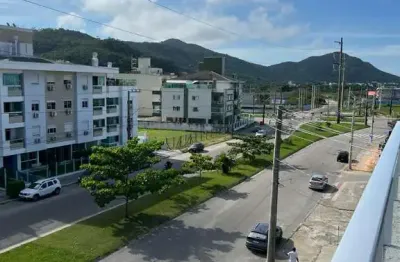 Ampla cobertura frente rua - com escritura pública - aproximadamente 1000 metros da praia dos ingleses.