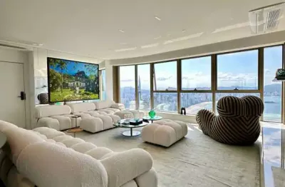 Apartamento andar alto com 4 suítes e 3 vagas de garagem em balneário camboriú