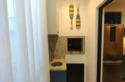 Apartamento mobiliado com 2 dormitórios sendo 1 suíte, 1 vaga de garagem no centro de camboriú