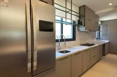 Apartamento com 3 suítes e 3 vagas de garagem na praia brava em itajaí