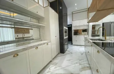 Casa triplex finamente mobiliada e equipada com 3 suítes e piscina com borda infinita em camboriú/sc