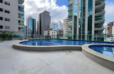 Apartamento vista mar com 3 suítes e 2 vagas de garagem no bairro meia praia em itapema
