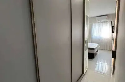 Apartamento mobiliado  com 2 suítes e 2 vagas de garagem em balneário perequê