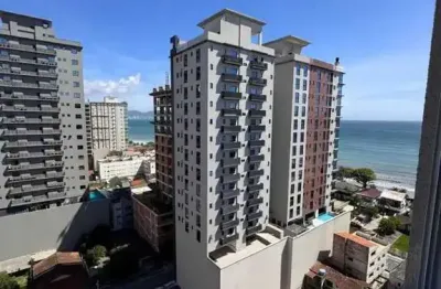 Apartamento vista mar com 2 suítes e 3 vagas de garagem em balneário perequê