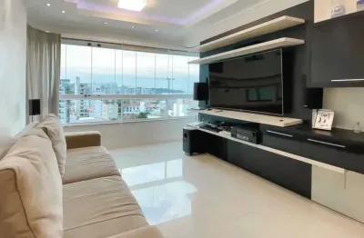 Apartamento mobiliado com 2 suítes e 2 vagas de garagem na praia brava em itajaí