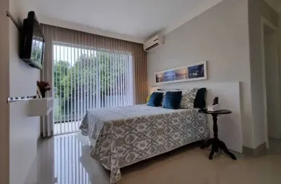 Casa de alto padrão com 4 suítes 4 vagas e terreno privativo de 513m² em bombinhas/sc