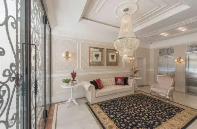 Apartamento com 3 suítes e 3 vagas de garagem em meia praia - itapema/sc