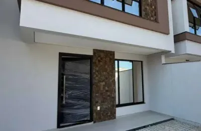 Geminado com 3 suítes e 2 vagas de garagem no bairro itacolomi em balneário piçarras/sc