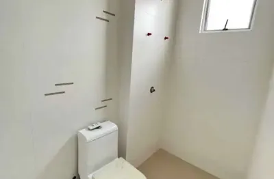 Apartamento com 4 suítes e 3 vagas de garagem em meia praia praia itapema/sc